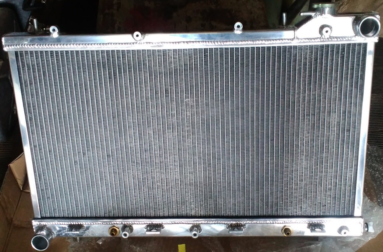 Радиатор алюминиевый Subaru Forester SF5 атмо 26мм AT