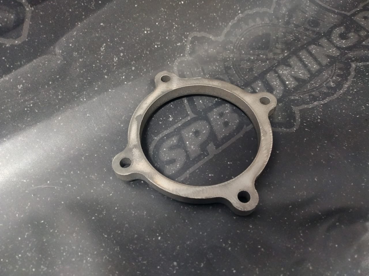 Фланец Tuning Toys на выход из турбины Garrett GT3076 нерж