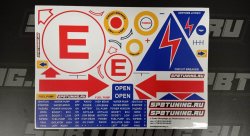 Наклейки, стрелки указатели буксировочного крюка, выключателя массы и система пожаротушения