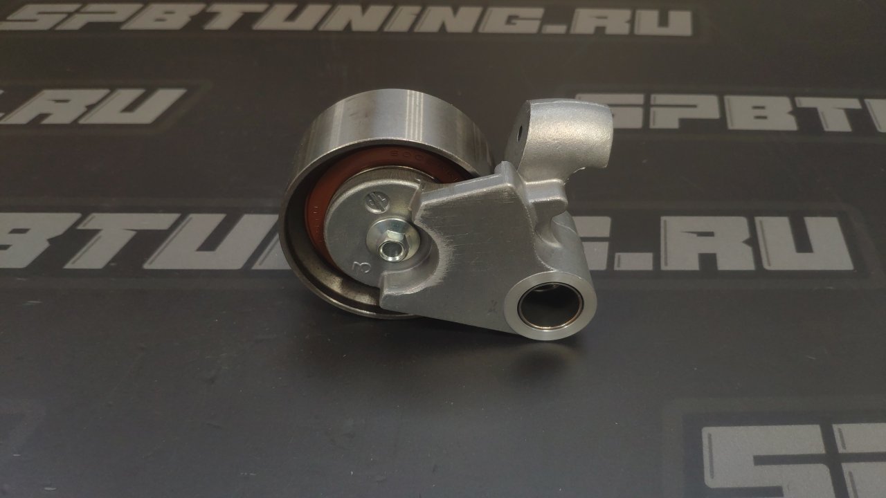 Ролик натяжной ремня ГРМ Toyota 2JZ (с кронштейном) оригинал