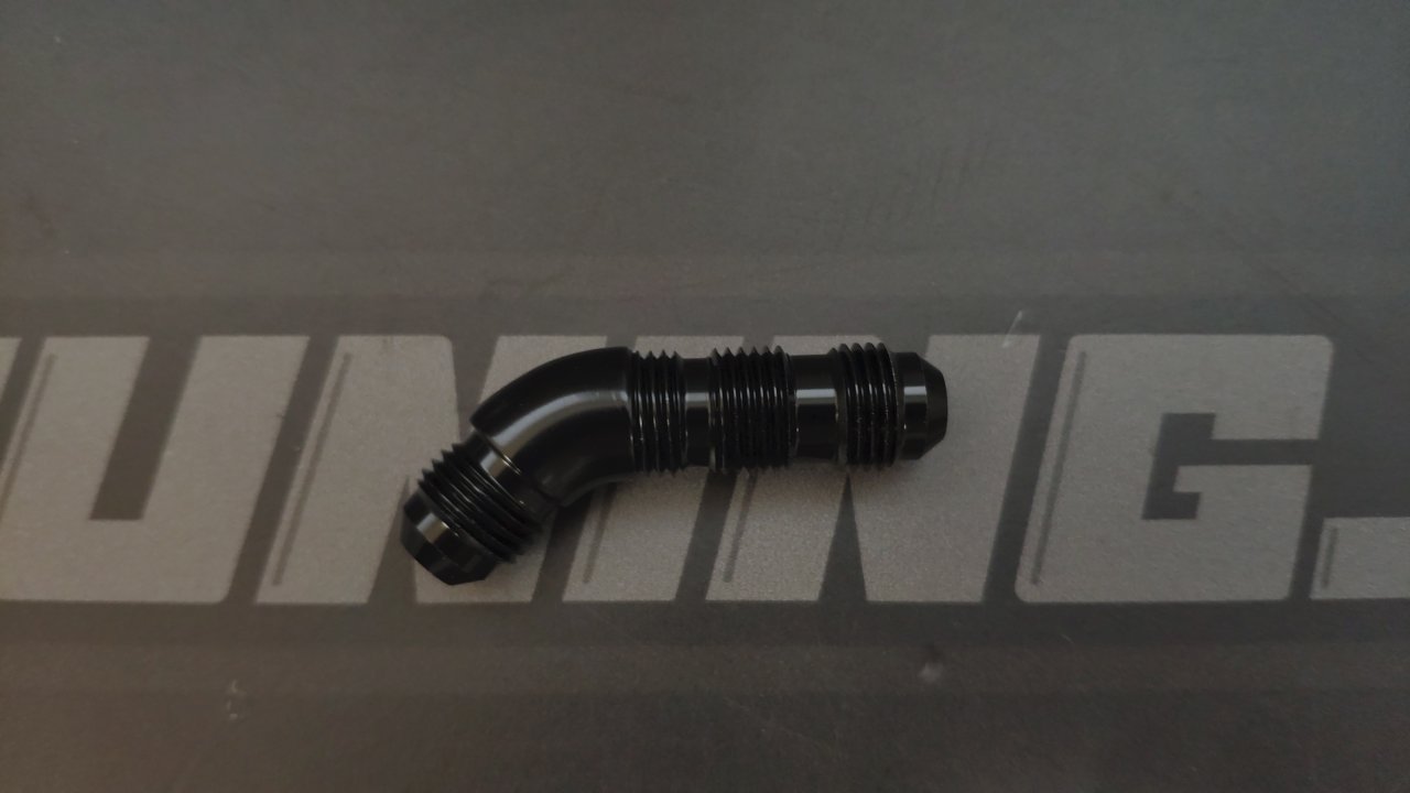 Адаптер проходной "полнопоточный" в перегородку AN6 - 45° (папа-папа) алюминий