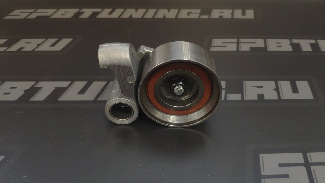 Ролик натяжной ремня ГРМ Toyota 2JZ (с кронштейном) оригинал